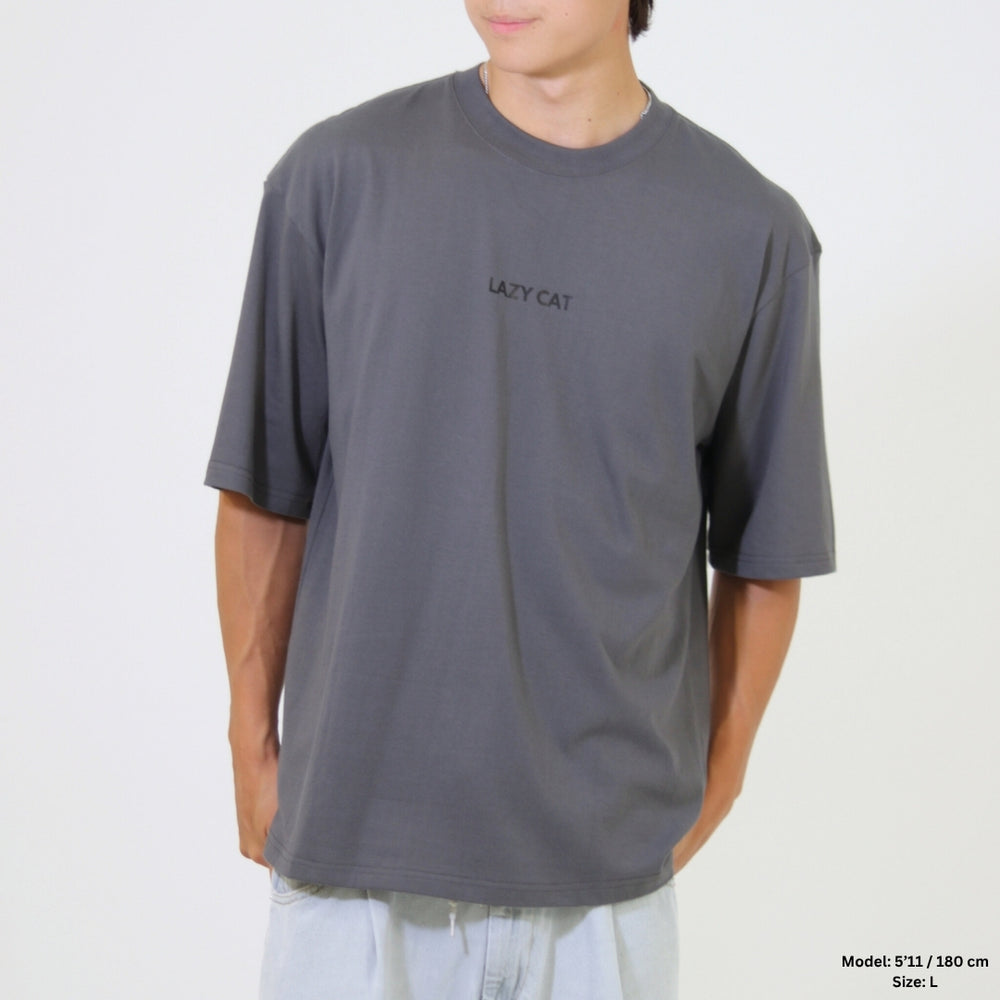 Person wearing a gray t-shirt with 'Lazy Cat' logo on a white background