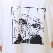 White t-shirt with black graphic design of a person with a halo and sunglasses.