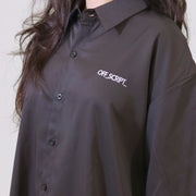 Black shirt with 'OFF.SCRIPT.' logo on a plain background