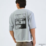 Person wearing a light gray t-shirt with a black graphic and 'OFFSCRIPT' text on the back, standing against a plain background.