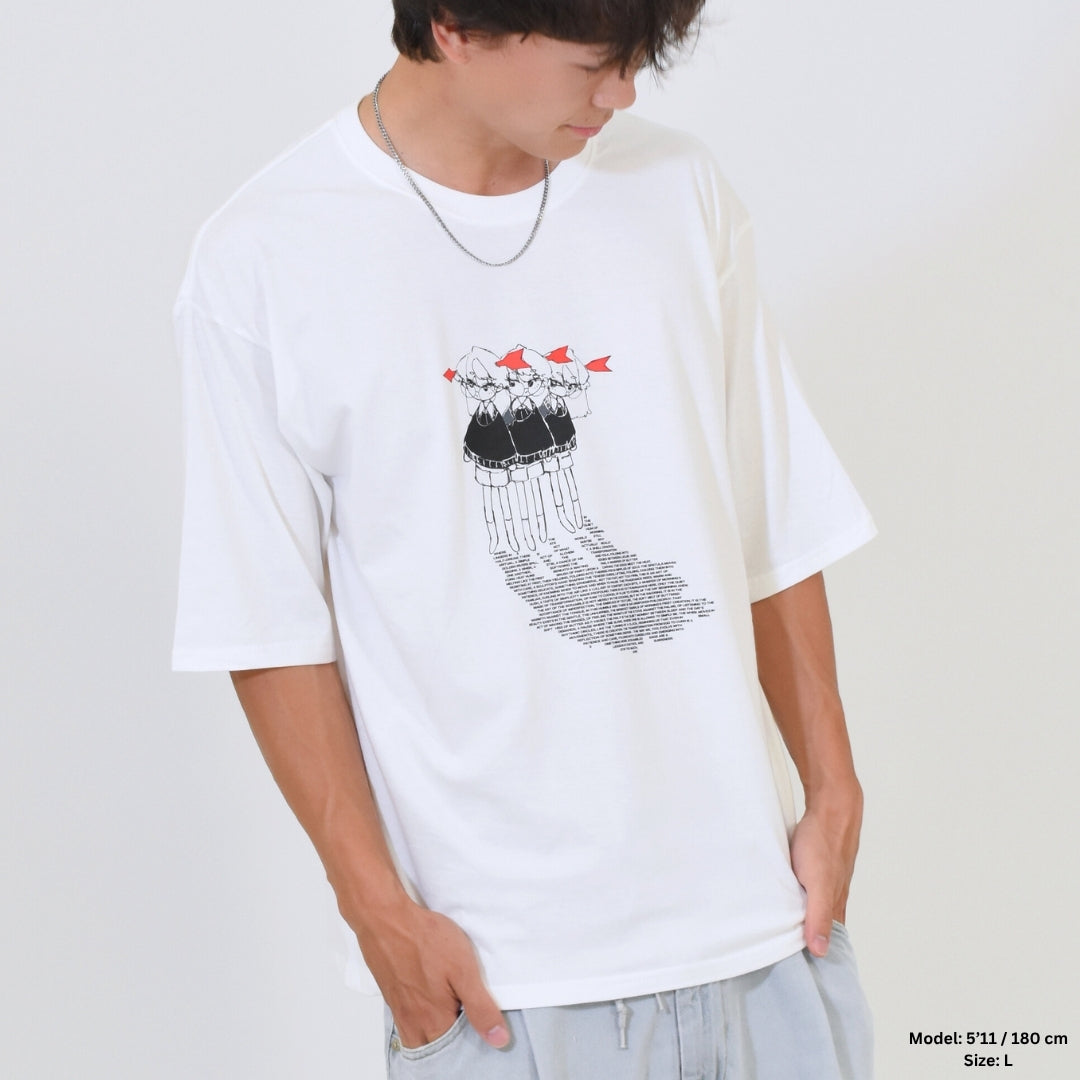 Person wearing a white t-shirt with a graphic design on a plain background