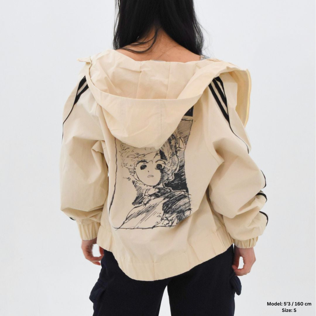 Beige hoodie with graphic design on a white background