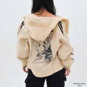 Beige hoodie with graphic design on a white background